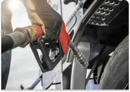 Driver pumping gas